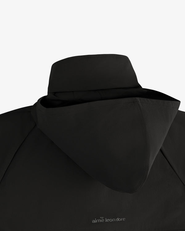 ALD Golf Cordura Tips Jacket in black with logo on back, shown against a white background.