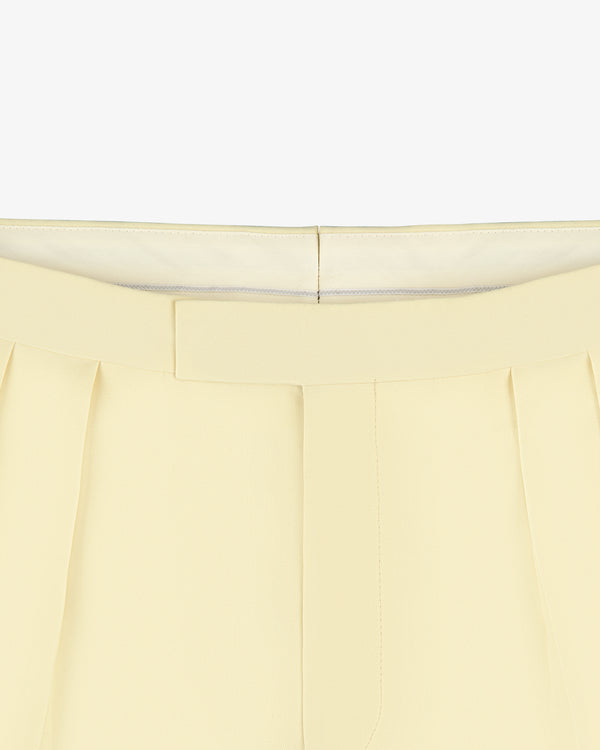 Close-up of the waistband and upper section of Gabardine Suit Trouser in cream, shown against a white background.