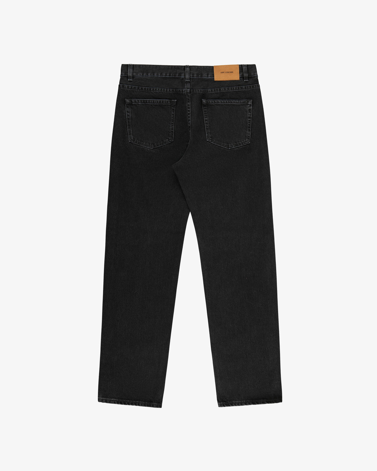 Back view of ALD Straight Fit Denim in black with two rear pockets and a tan leather patch on the waistband.