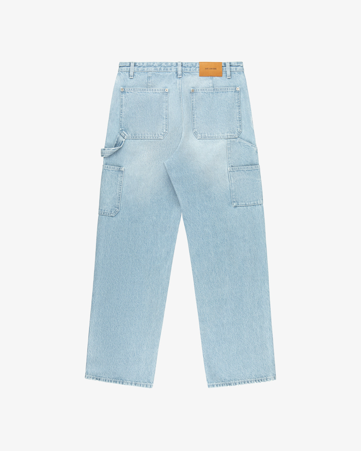Denim Carpenter Pant in light blue, shown from the back with large patch pockets and a tan leather waistband patch.