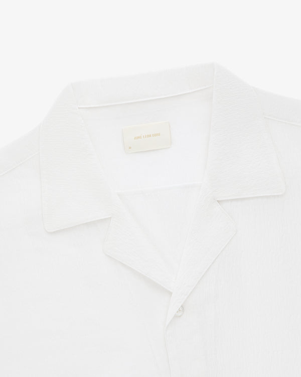 Alpo Shirt: White collared shirt with visible label inside collar, displayed on plain white background.
