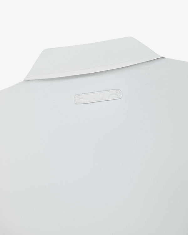 Close-up of the back collar on the Colorblock Sport Shirt, featuring a small rectangular patch near the neckline.