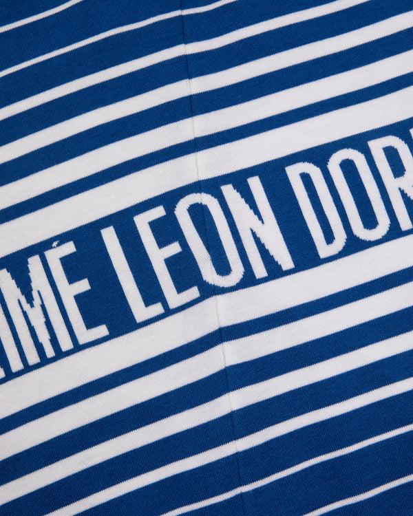 Blue and white striped WINDSTOPPER® Knit Cycling Jersey with white “ME LEON DOR” text across the stripes.