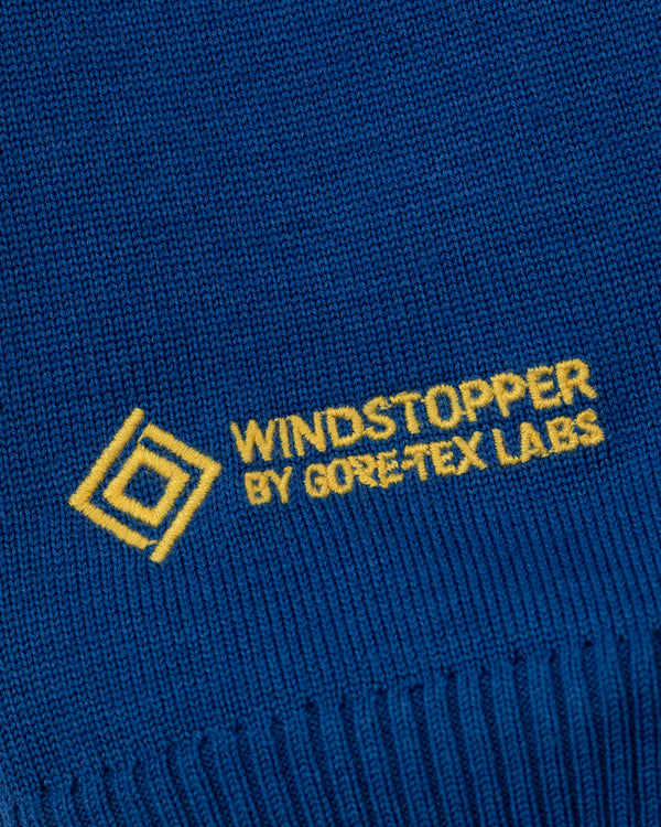 Blue WINDSTOPPER® Striped Knit Cycling Jersey by GORE-TEX LABS with yellow text and a square logo stitched on it.