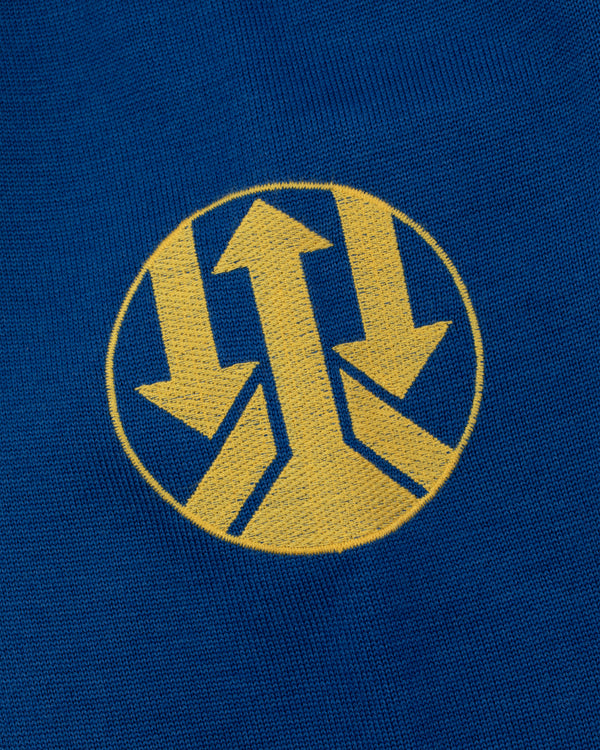 Yellow circle with three arrows on blue WINDSTOPPER® Striped Knit Cycling Jersey by GORE-TEX LABS.