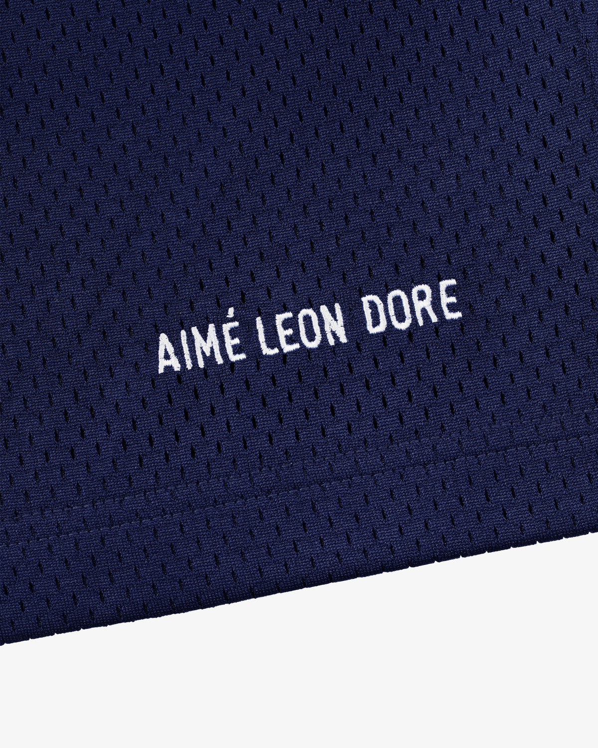 Navy blue mesh Logo Gym Short with AIMÉ LEON DORE embroidered in white near the hem.