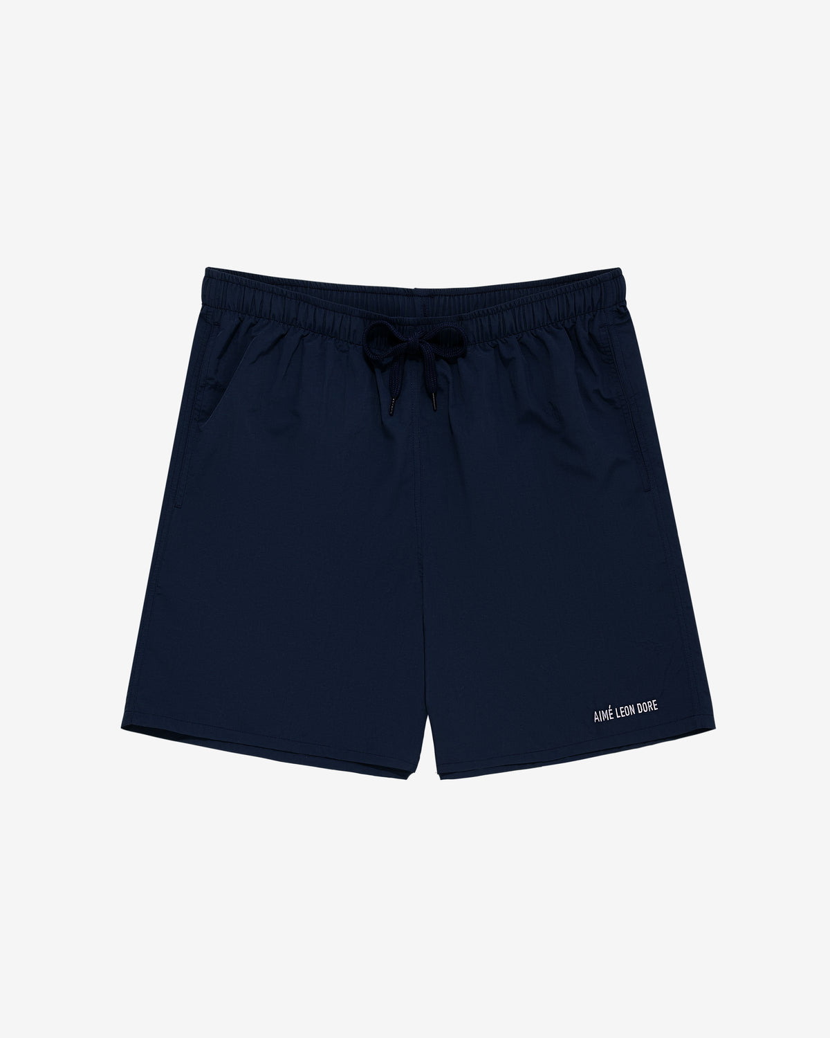 Core Nylon Short in navy with elastic waistband, drawstring, pockets, and small white leg text.