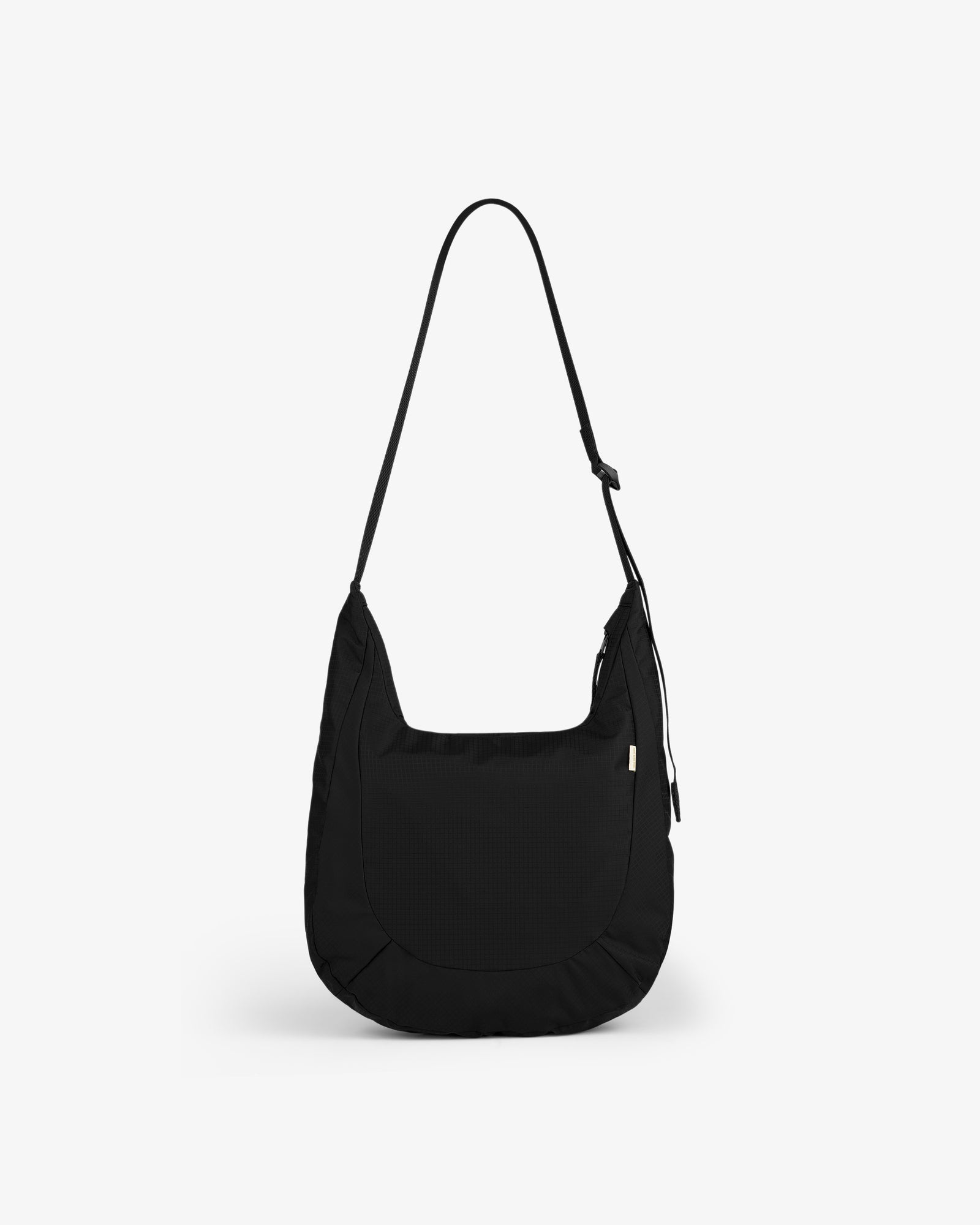Black Nylon Messenger Bag with a long strap, zipper closure, and front pocket, shown on a white background.