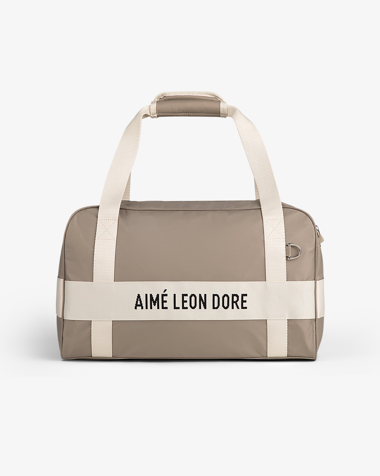 Nylon Duffle Bag in taupe with white handles and AIMÉ LEON DORE text, shown on a white background.