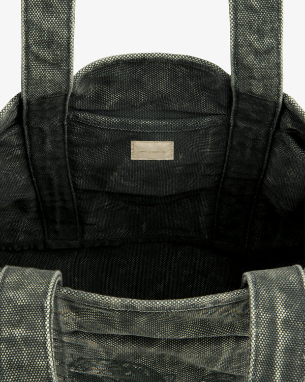 Top view of the Sun Faded Large Unisphere Tote Bag, gray and textured, with interior label near the top seam.
