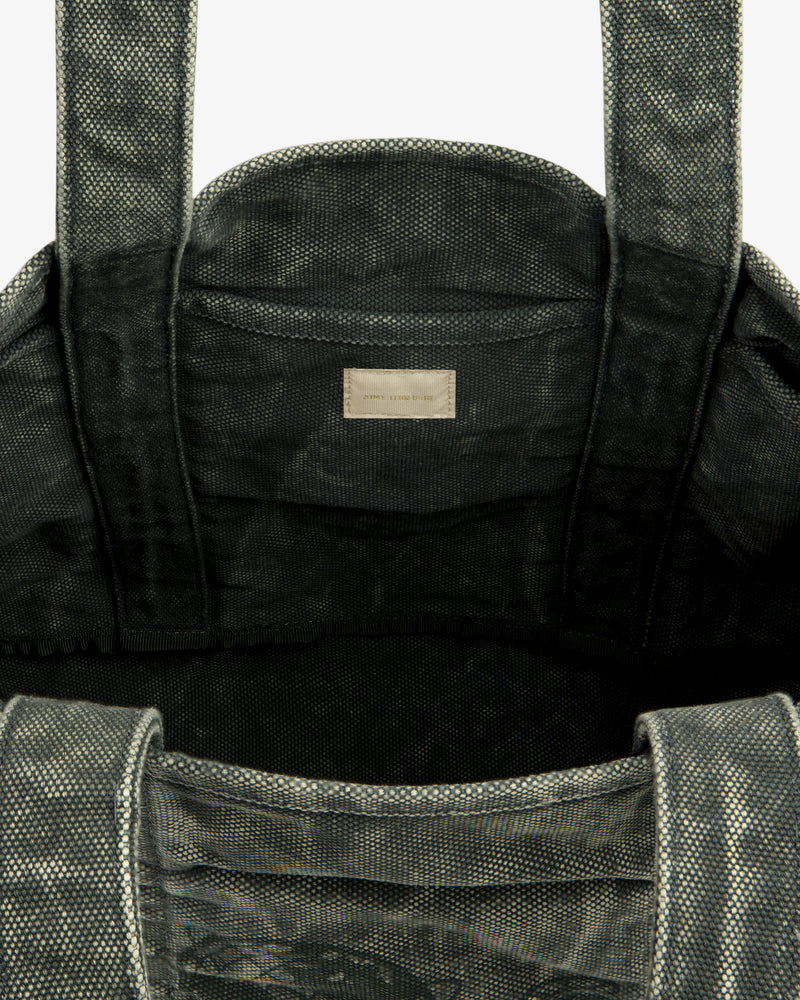 Top view of the Sun Faded Large Unisphere Tote Bag, gray and textured, with interior label near the top seam.