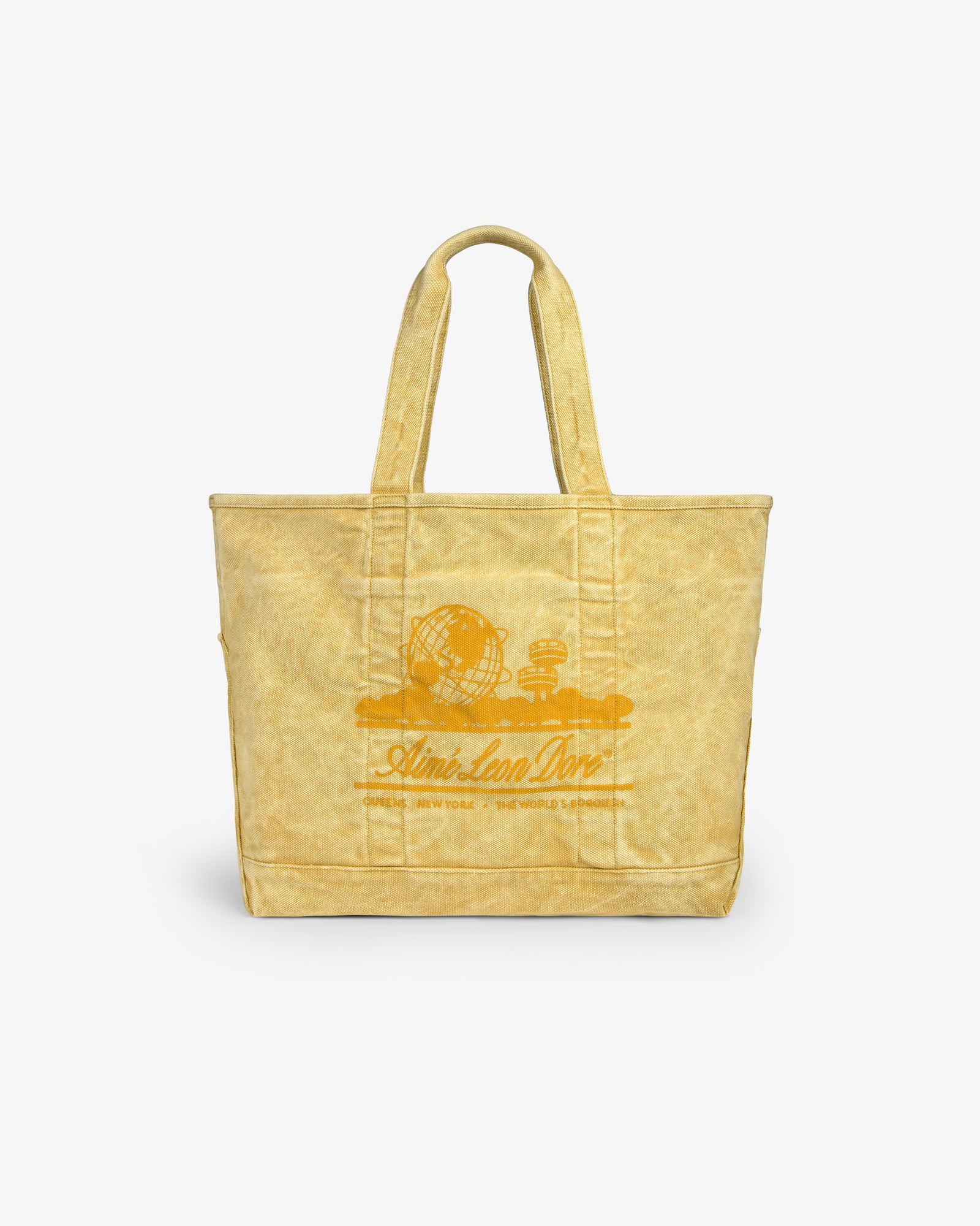 Sun Faded Large Unisphere Tote Bag with two handles and a printed globe graphic with text on the front.