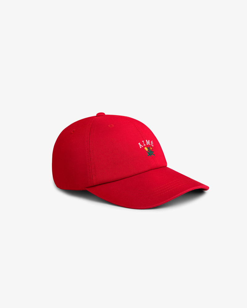 Crest Logo Hat—red, with small embroidered text and a rose, shown on a plain white background.