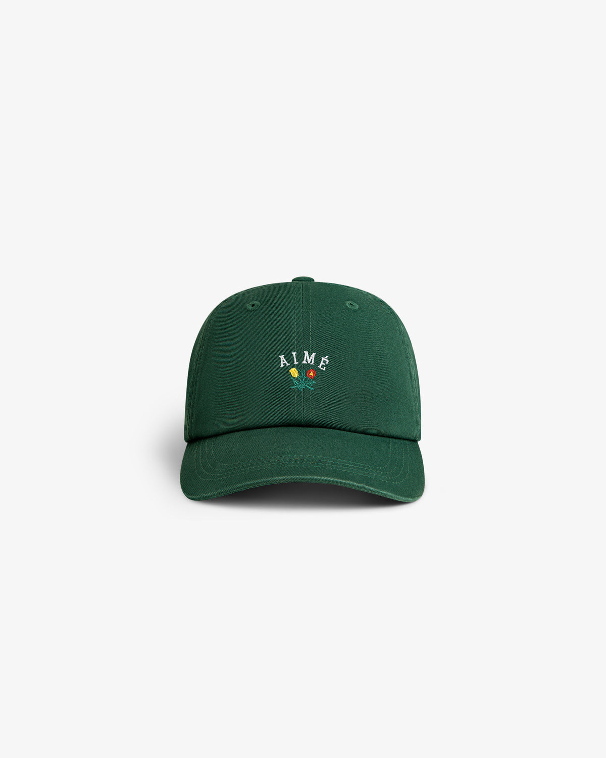 The Crest Logo Hat is a green cap with “AIMÉ” and a small floral design on the front, shown on a white background.