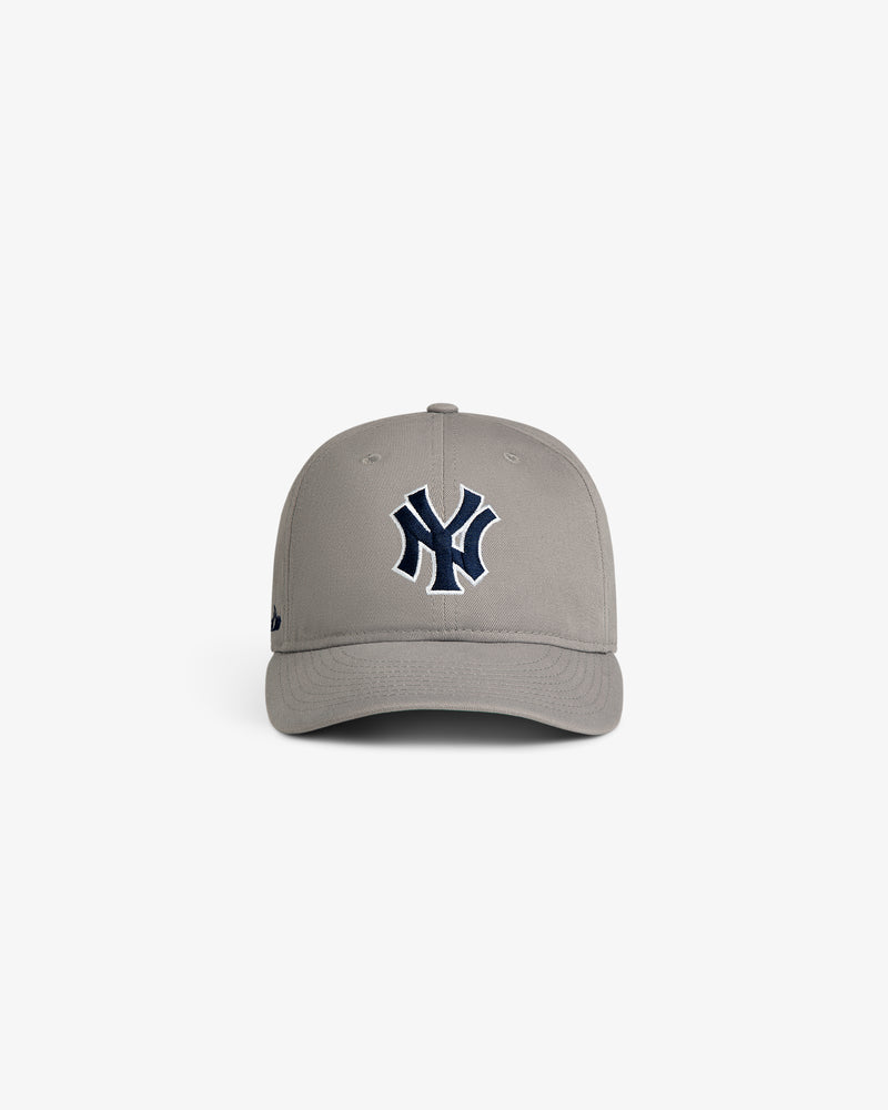 Front view of the ALD / New Era Yankees Retro Fit Hat in gray with a dark blue New York Yankees logo on front.