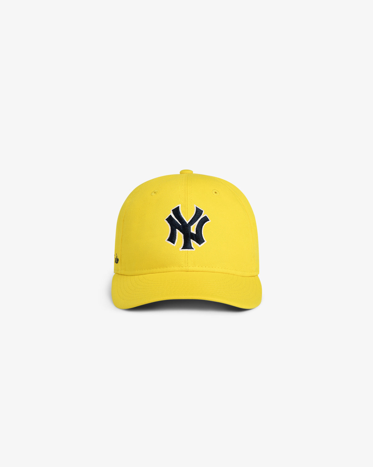 ALD / New Era Yankees Retro Fit Hat in bright yellow with large black NY logo, front view on white background.