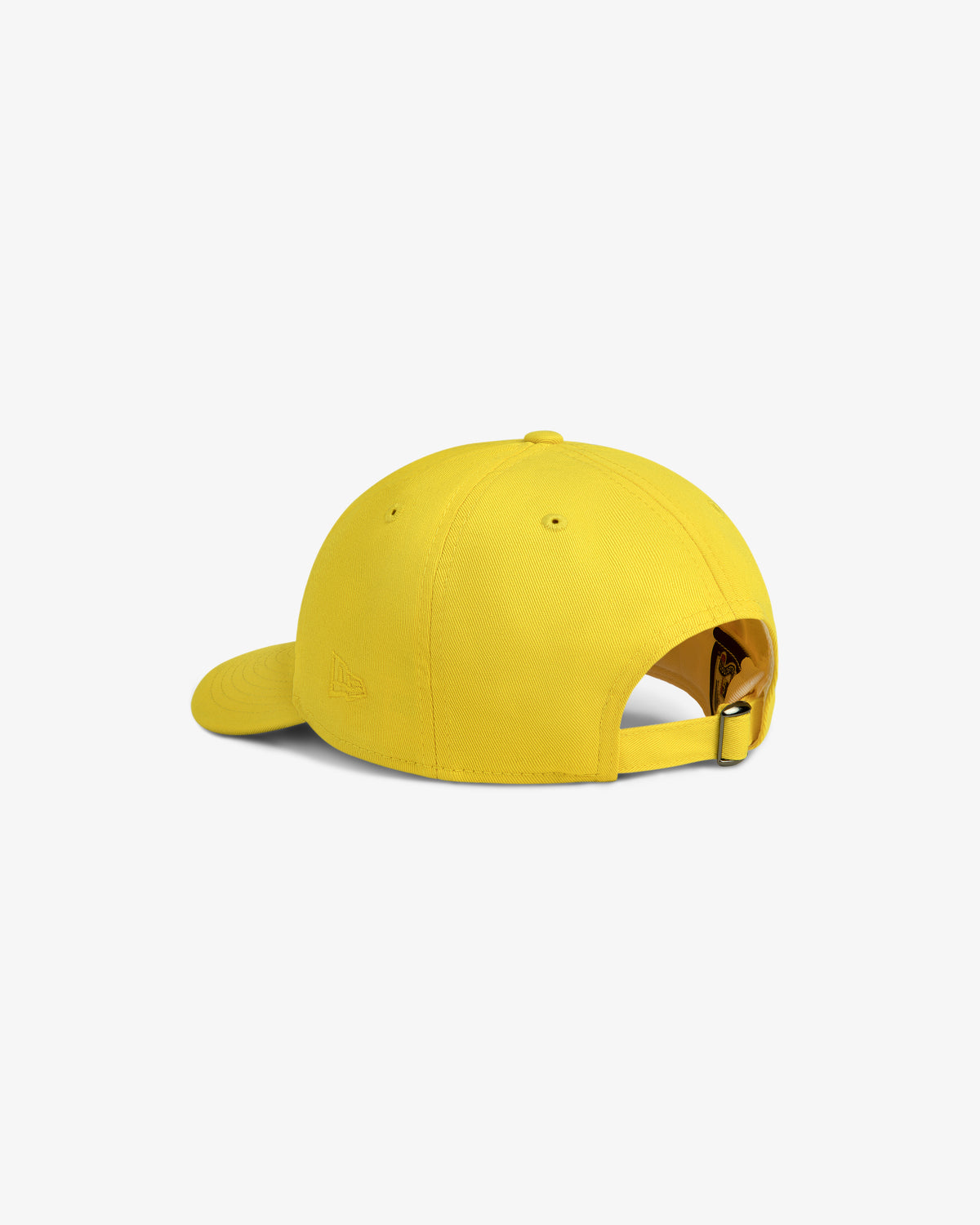 The ALD / New Era Yankees Retro Fit Hat in yellow features an adjustable back strap with a metal buckle.