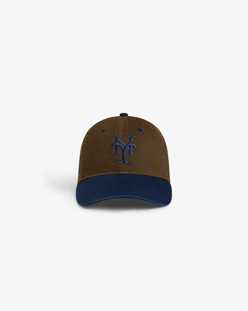 ALD / New York Mets Colorblock Ballpark Hat in brown/navy with interlocking NY logo, shown on white background.