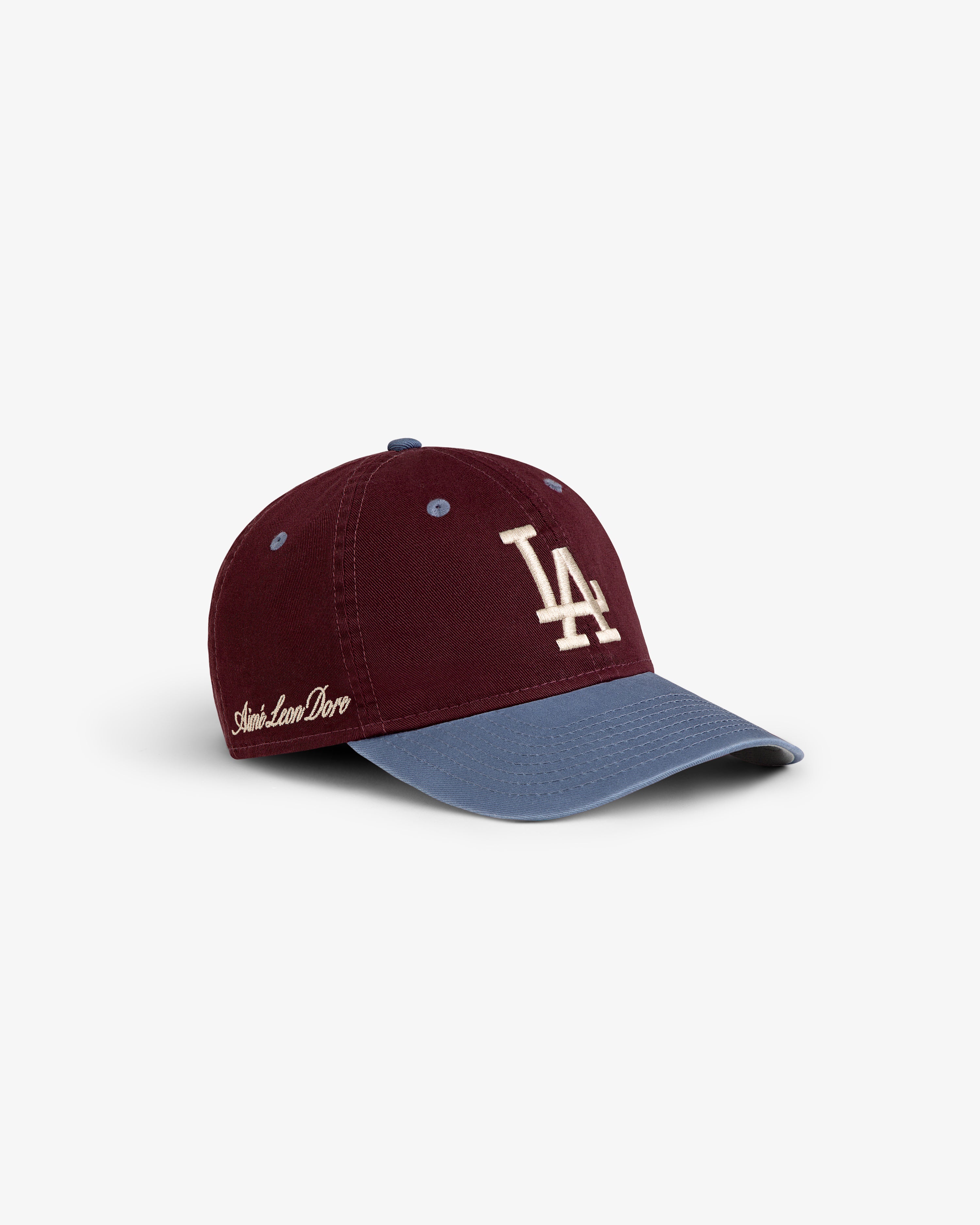 ALD / LA Dodgers Colorblock Ballpark Hat in burgundy with blue brim and white LA logo, shown on a white background.
