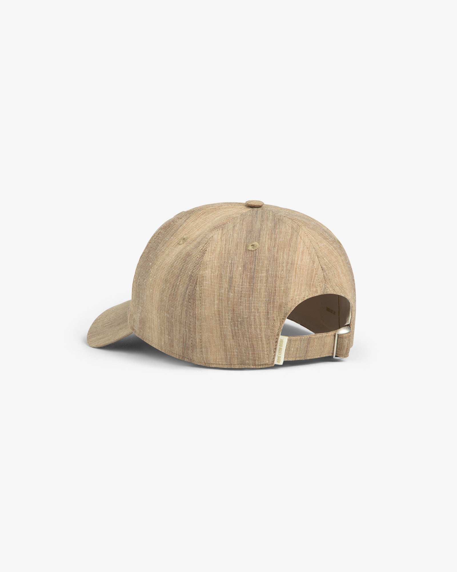 The Safari Heritage Hat is a tan textured baseball cap, shown from the back with an adjustable strap and metal buckle.