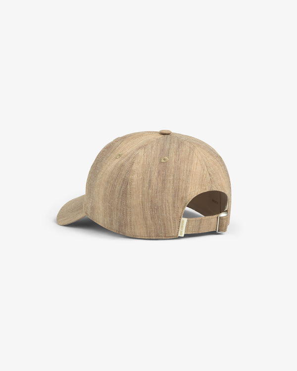 The Safari Heritage Hat is a tan textured baseball cap, shown from the back with an adjustable strap and metal buckle.