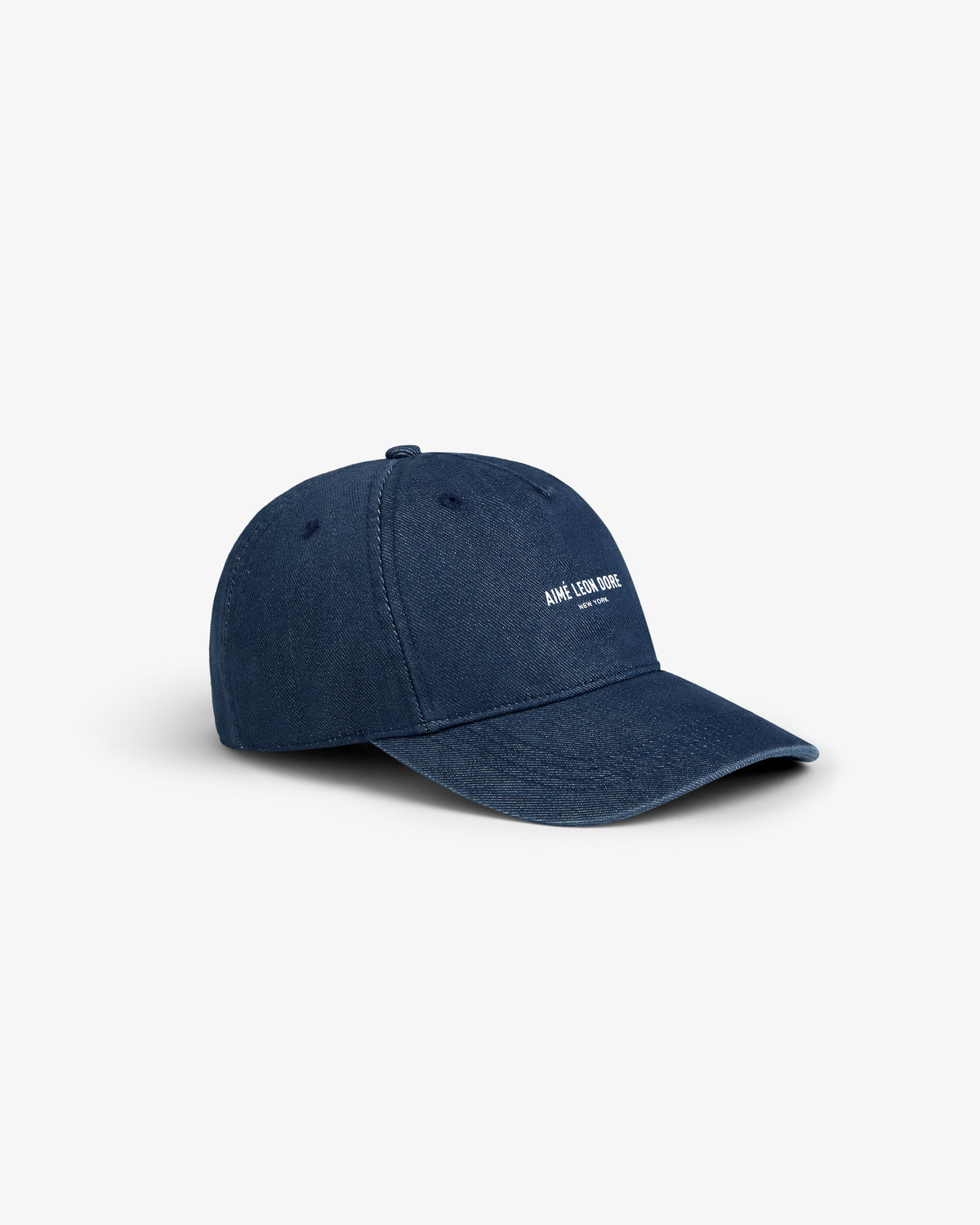 Vintage Micro Logo Hat in navy blue with a curved brim and small white front text, shown on white background.