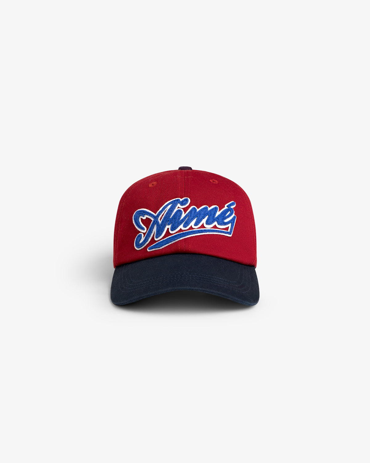 Cycling Logo Hat in red and navy with Aimé embroidered in white and blue script on the front, front view.