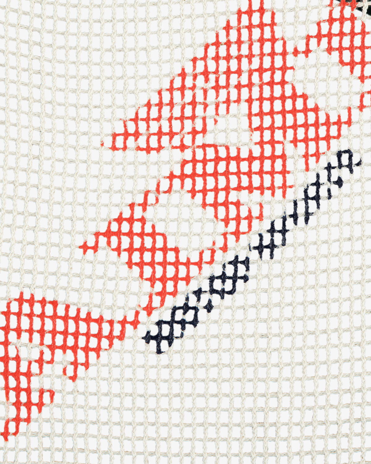 Close-up of Aimé Painters Hat showing red and black stitched letters on white grid mesh fabric.