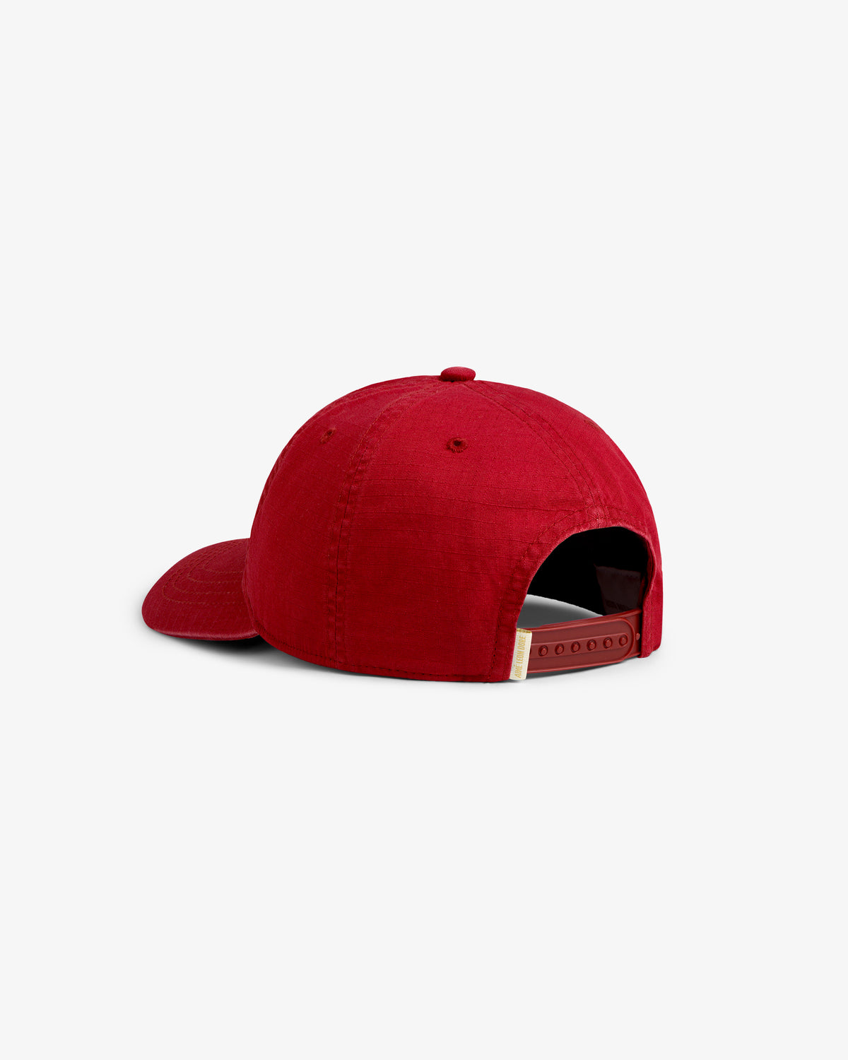 The Sun Faded Unisphere Hat is a red cap with a curved brim and adjustable strap, shown from the back.