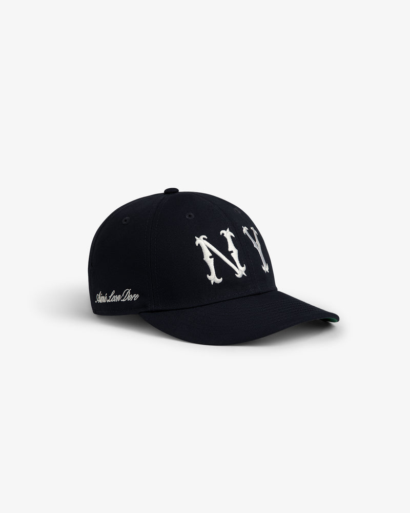 ALD / New Era Highlanders Retro Fit Hat with NY in white gothic letters and Saint Louis Dive embroidered on the side.