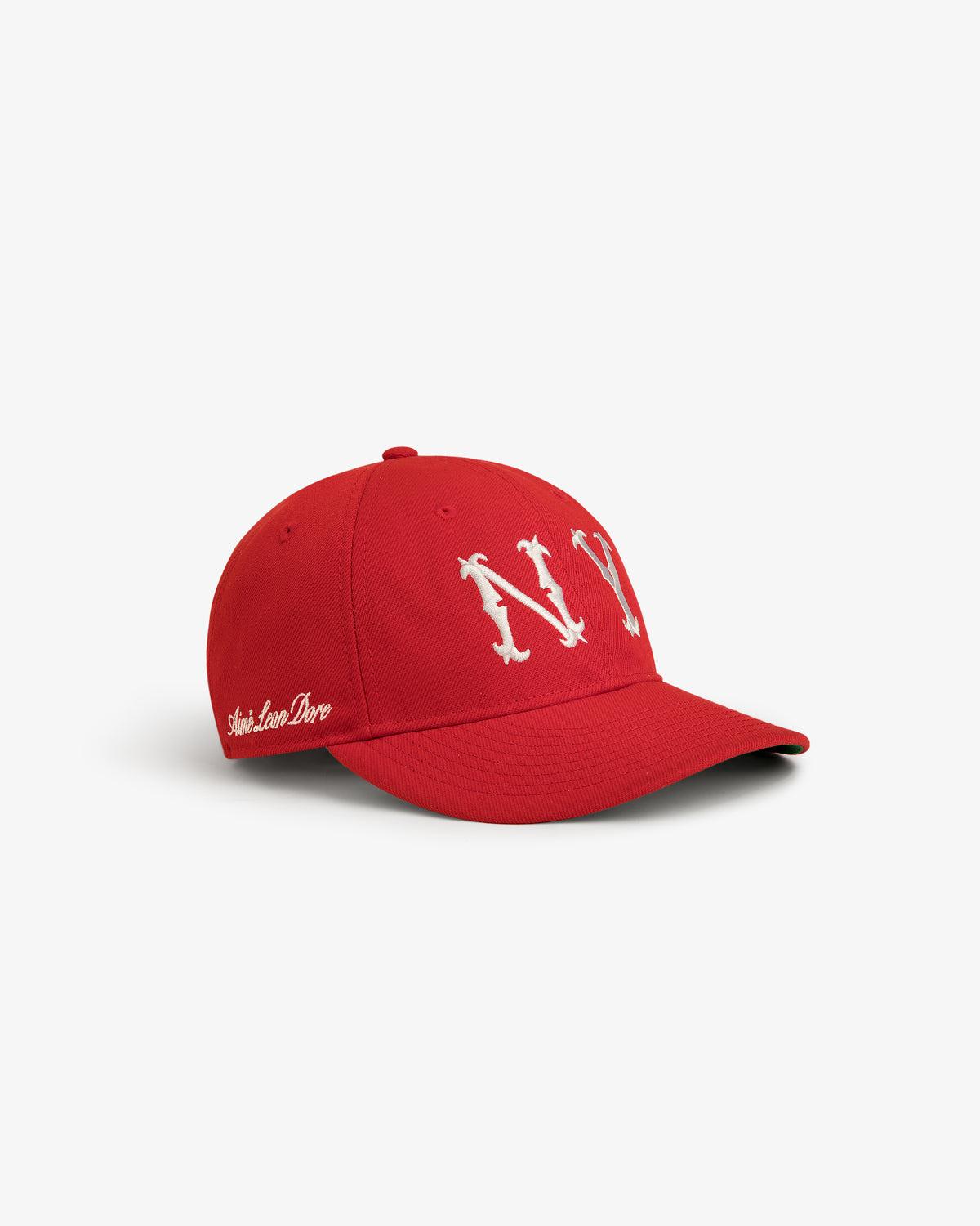 ALD / New Era Highlanders Retro Fit Hat: red cap with white NY front and Smile, Love, Dare text, on white background.