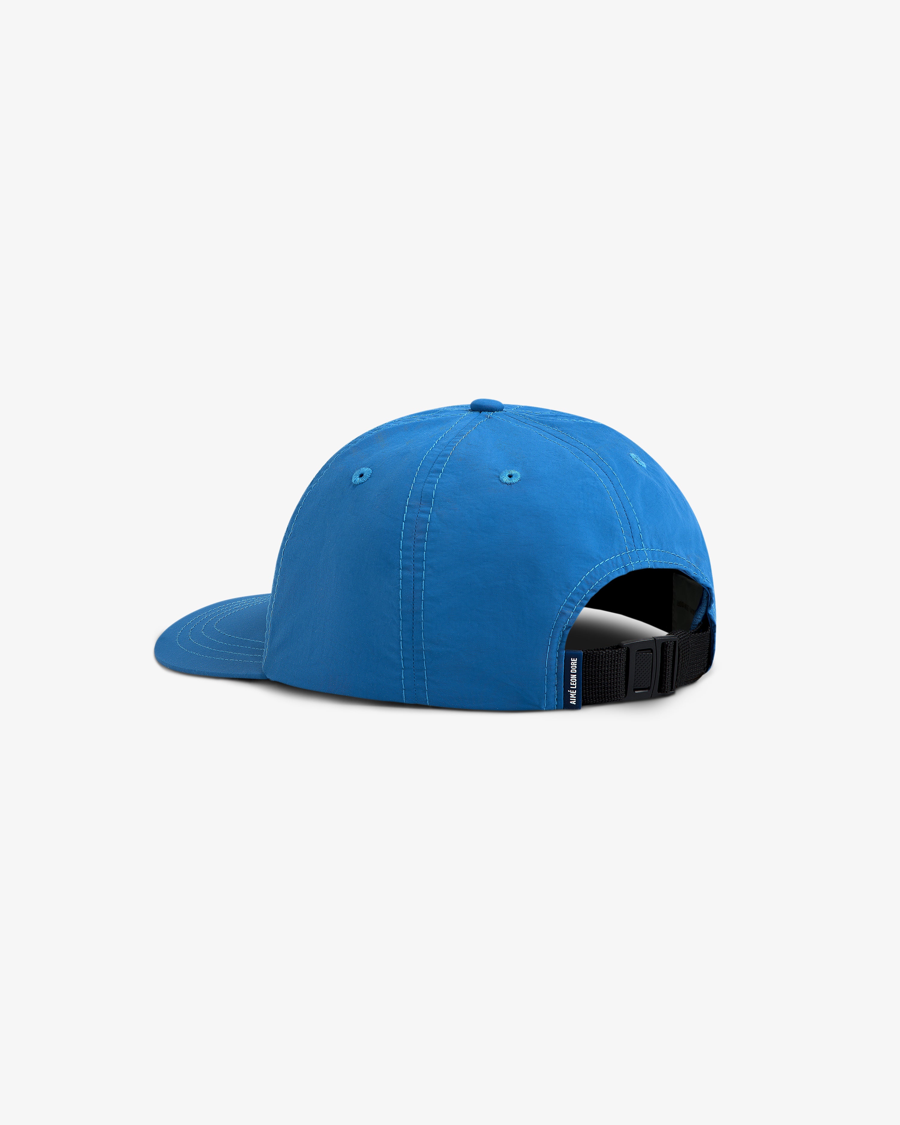 A blue Nylon Sport Hat viewed from the back, featuring an adjustable black strap and stitched eyelets.