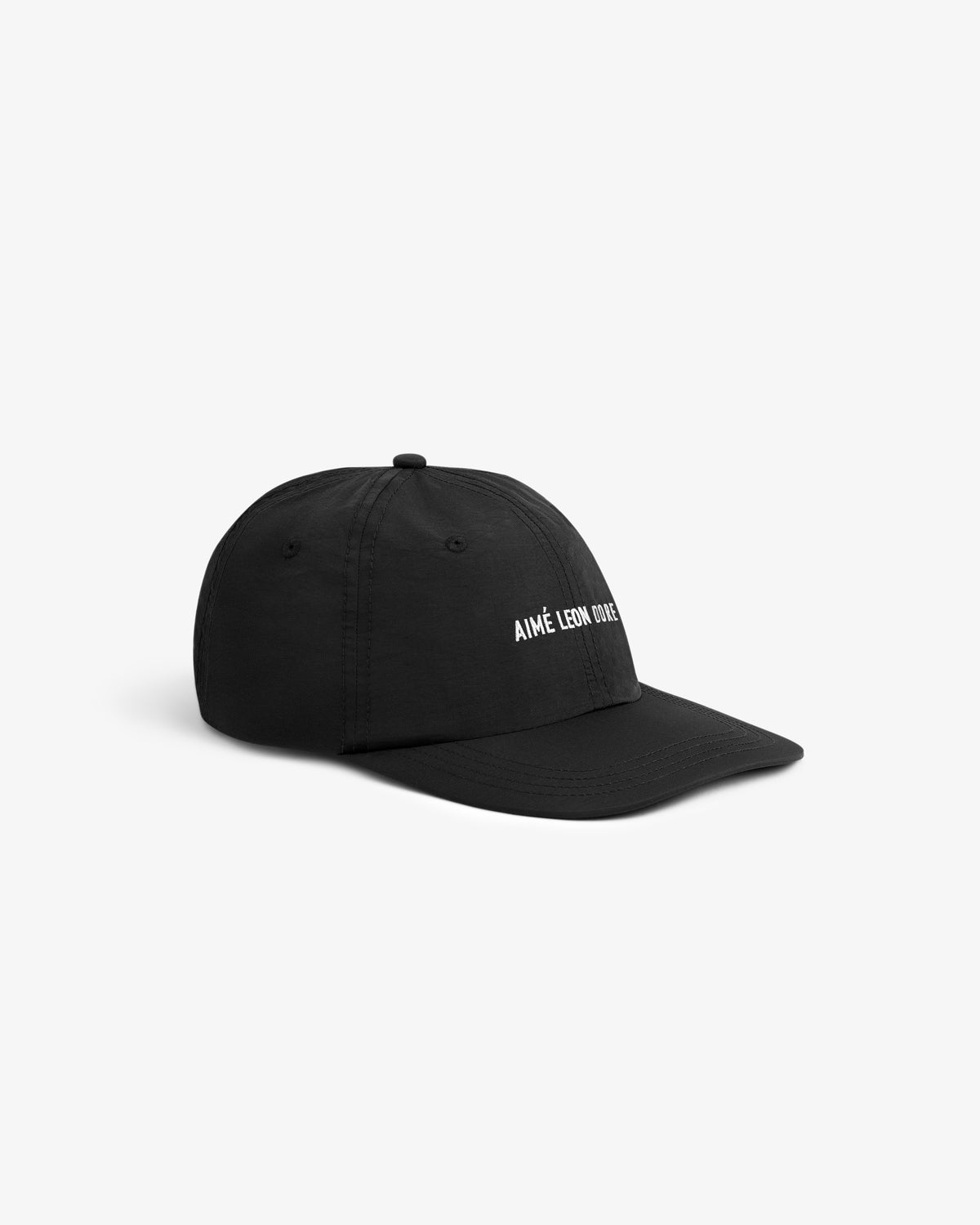 Black Nylon Sport Hat with AIMÉ LEON DORE white embroidery on front, displayed on a white background.