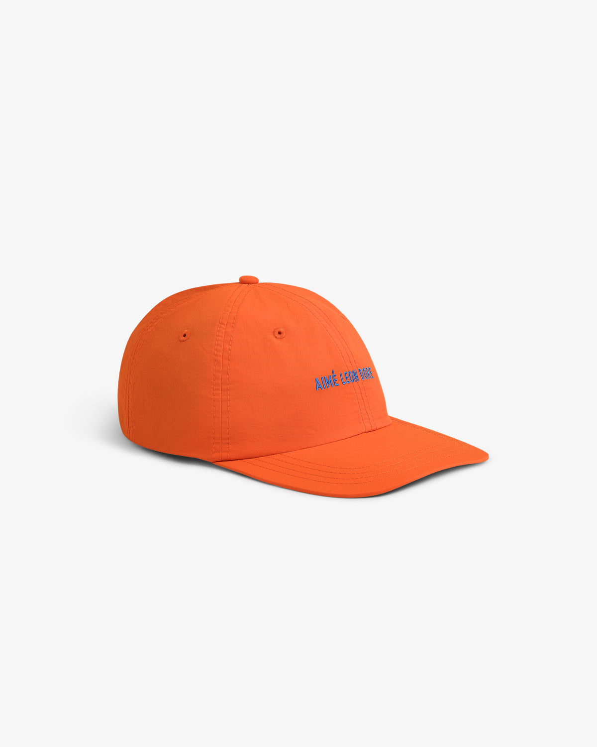 A Nylon Sport Hat in orange with small blue text on the front, shown against a white background.