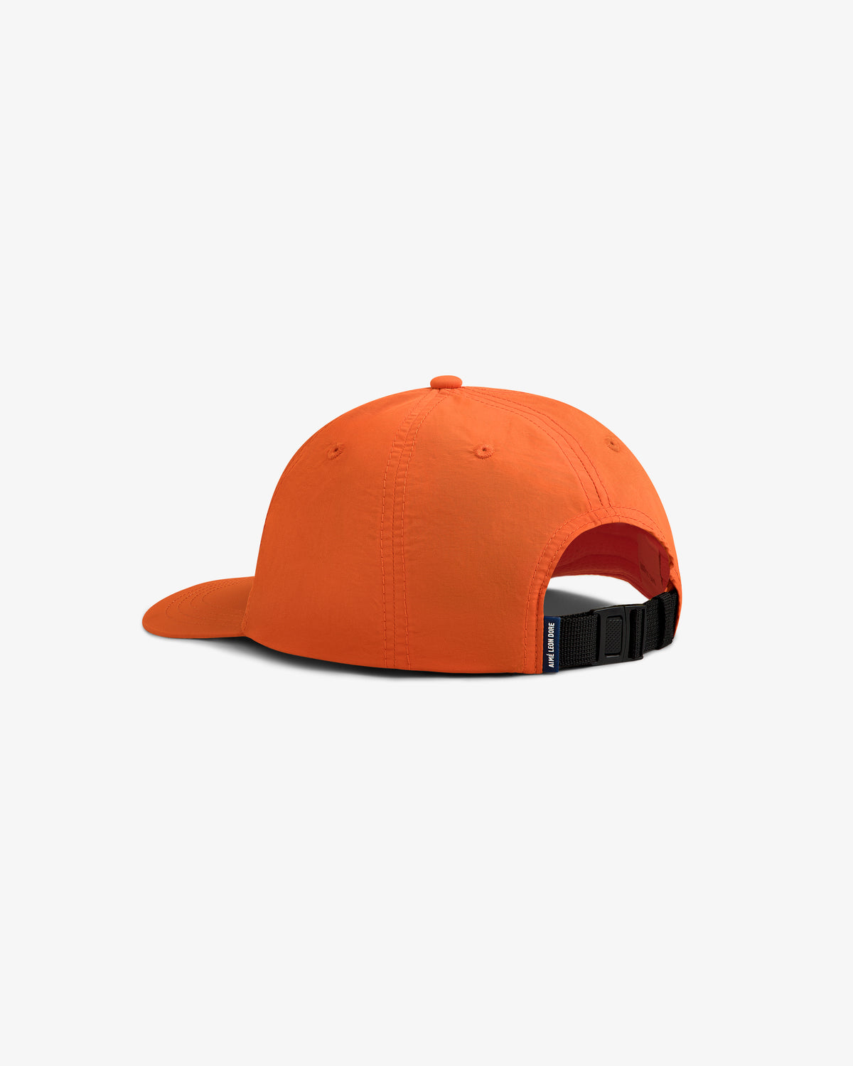 Nylon Sport Hat in bright orange, shown from the back with a black adjustable strap and small blue tag.