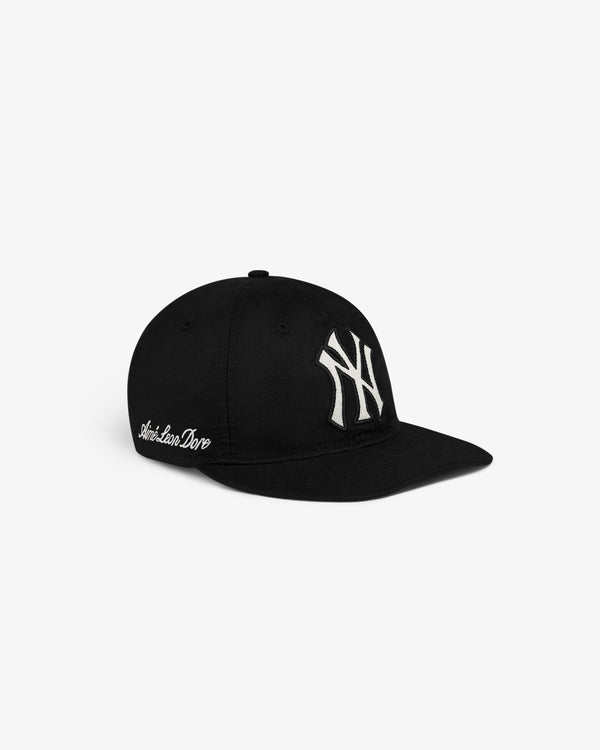 ALD / New York Yankees Retro Fit Hat with white NY logo and André Saraiva Dove embroidered on the side.