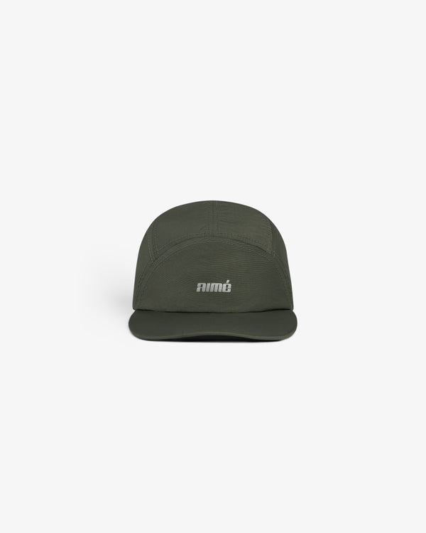 Dark green Aimé Performance Sport Hat with white "animé" text on front, shown against a plain white background.