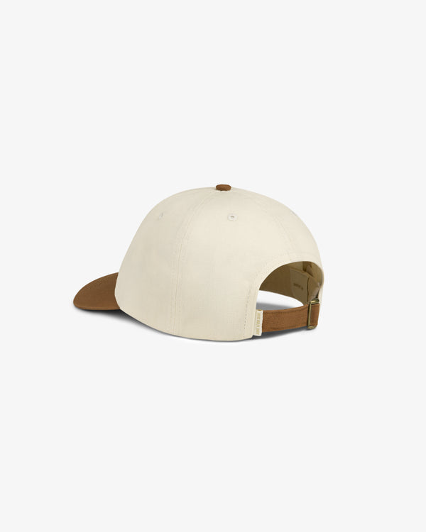 Saint George Logo Hat in beige with a brown brim and adjustable strap, displayed from the back on white.