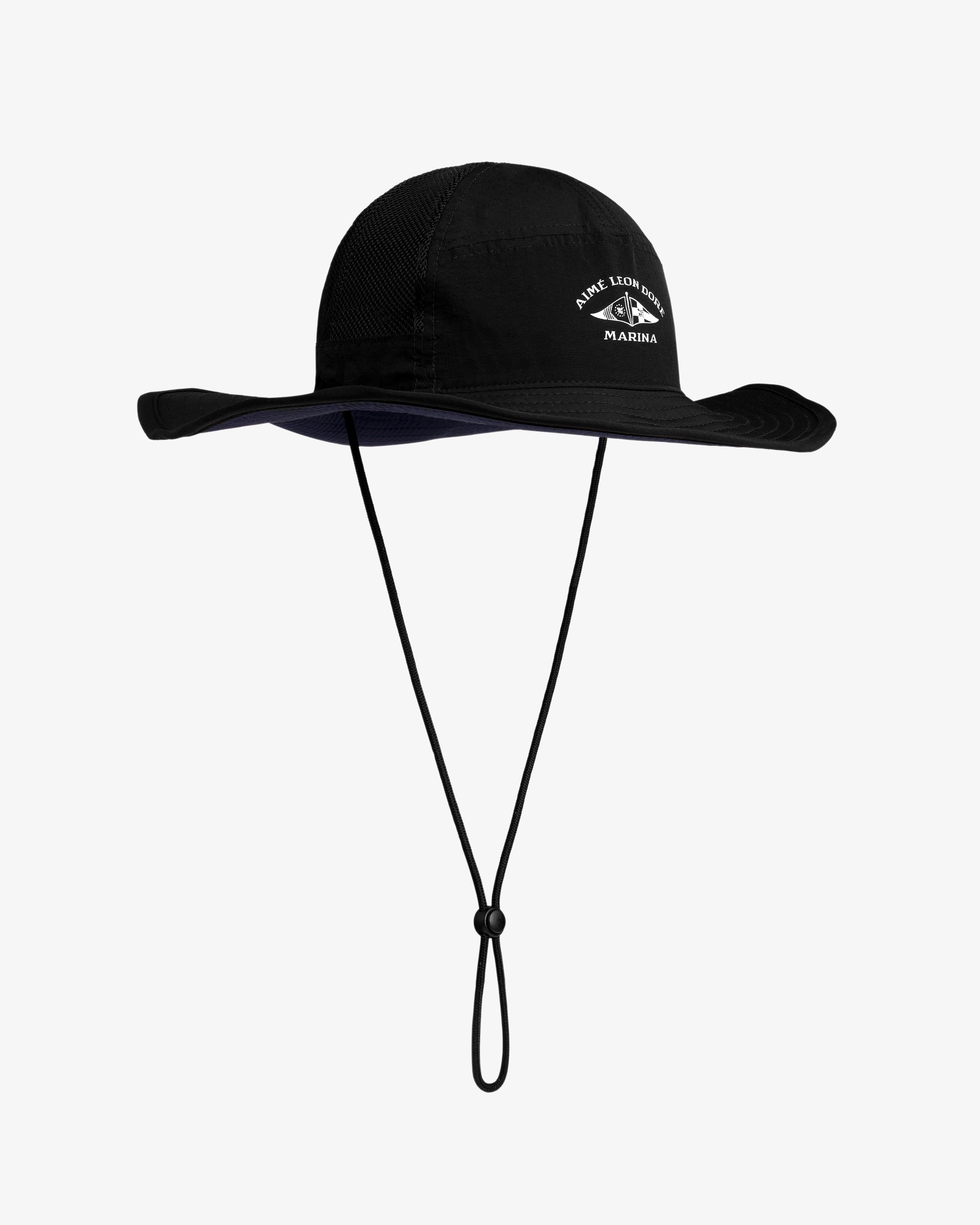 Marina Boonie Bucket Hat: black, wide brim, chin straps, and white embroidered front logo and text.