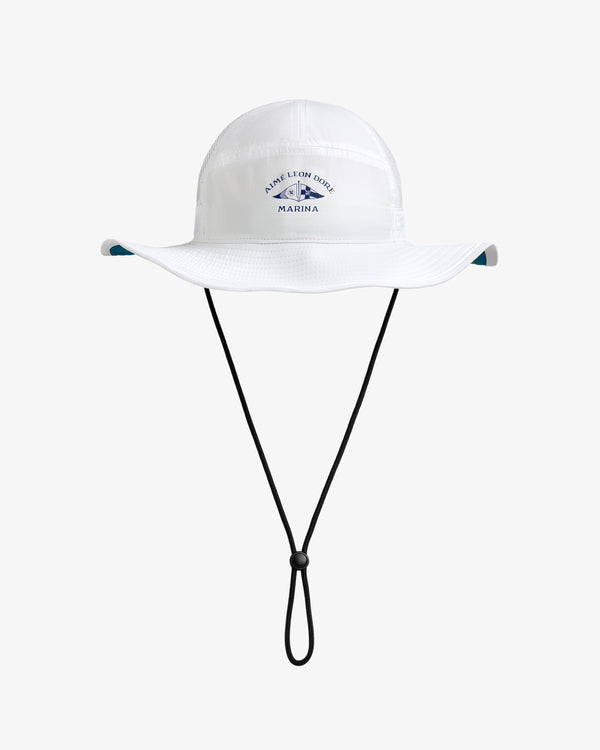 White Marina Boonie Bucket Hat with wide brim, chin strap, and blue Aime Leon Dore Marina text on the front.