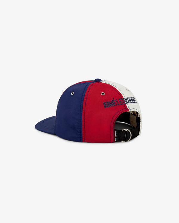 A Nylon Deck Hat in blue, red, and white with "NINETEEN FOUR" on the back, shown from the rear.