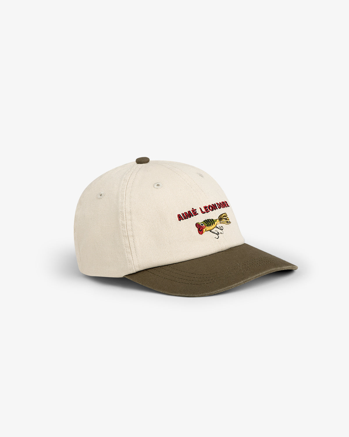 Colorblock Lure Hat: beige and olive green cap with an embroidered fish and "Amade Agonious" on the front.