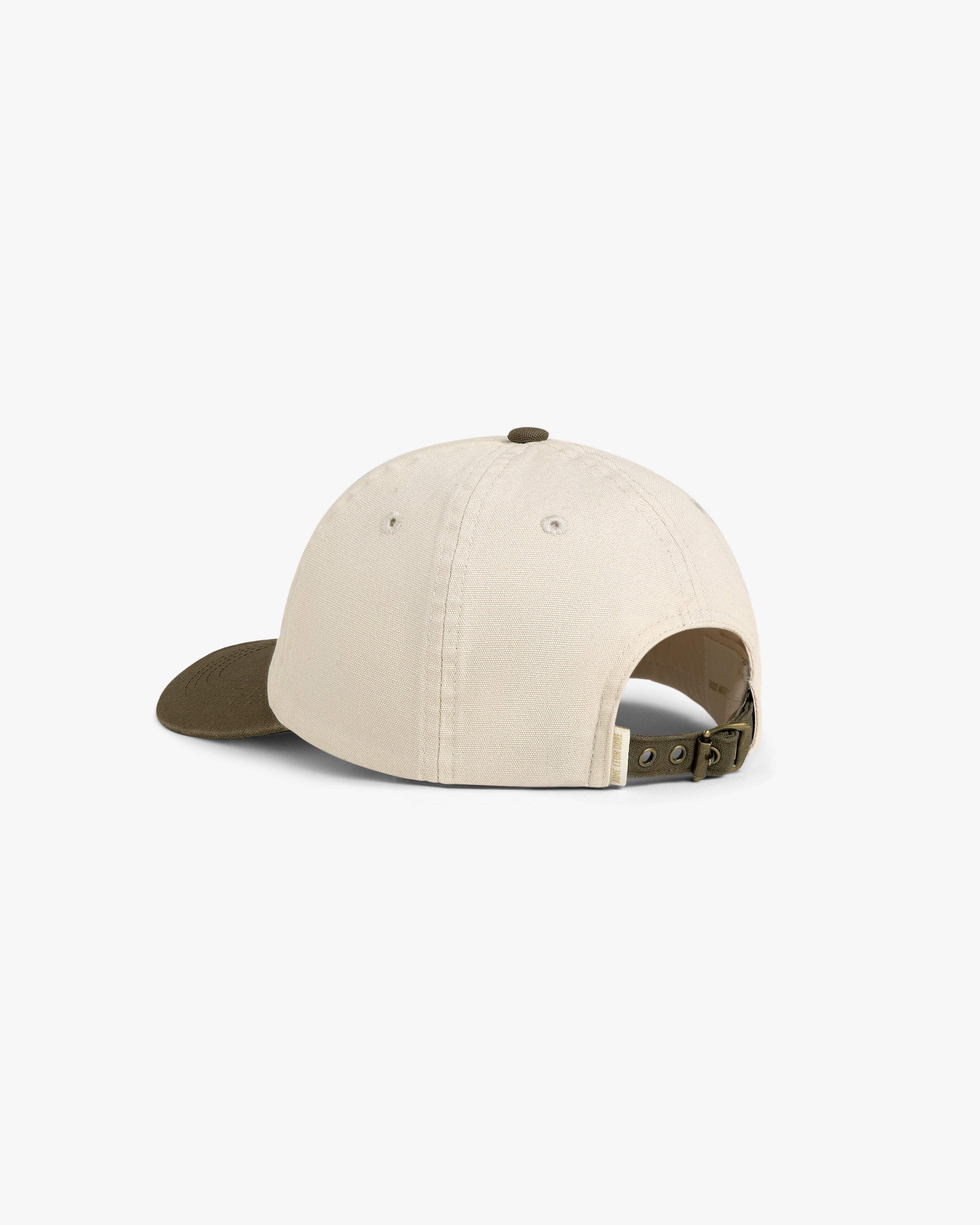 Colorblock Lure Hat: beige baseball cap with olive green strap and brim, shown from the back on white.