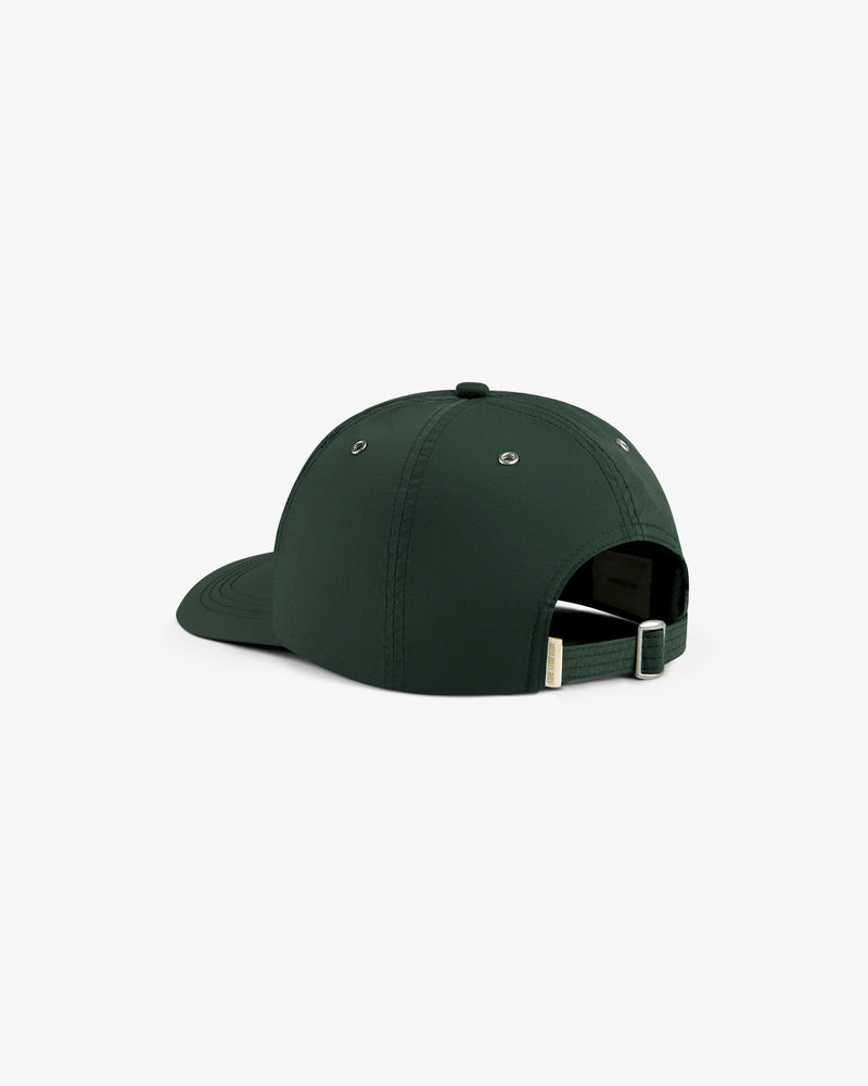 ALD / Technics Nylon Logo Hat in dark green, back view with adjustable strap and metal buckle on white background.