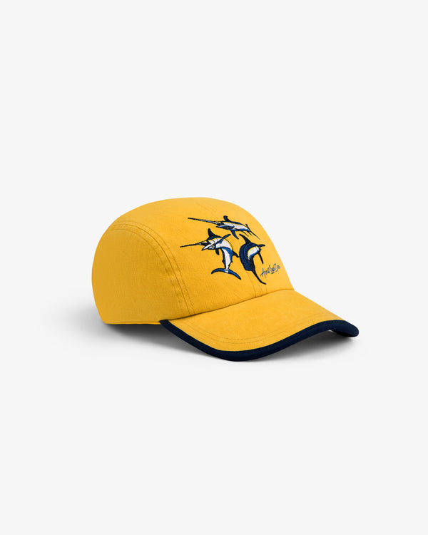 Souvenir Fishing Hat: yellow cap with embroidered swordfish and navy blue brim trim on a white background.