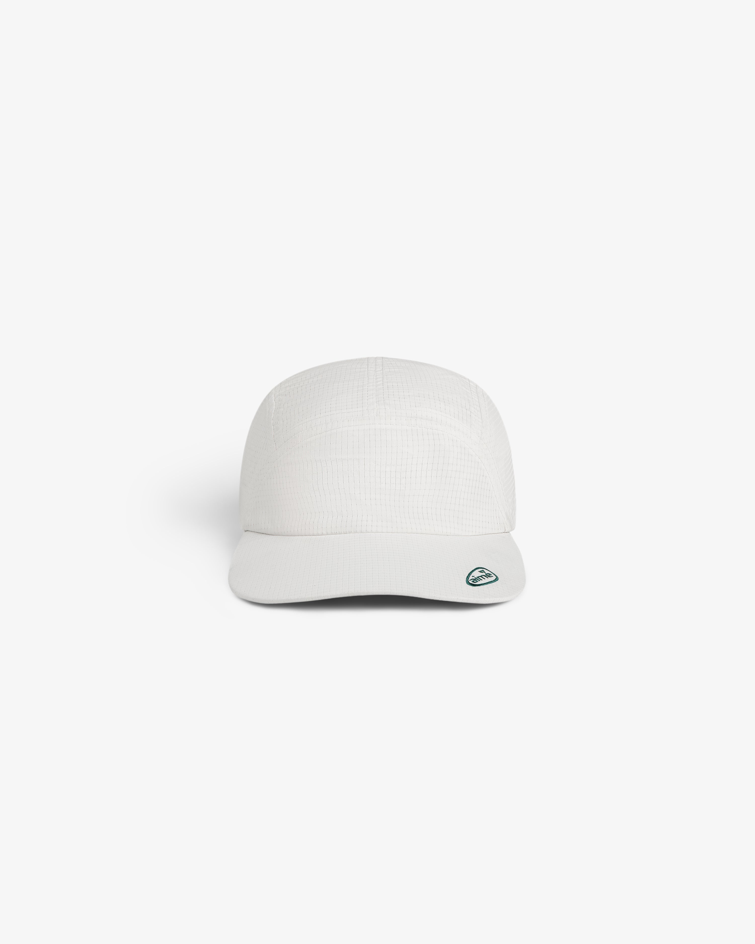 The ALD Golf Performance Sport Hat is a white cap with a small blue-green logo on the brim, shown on a white background.