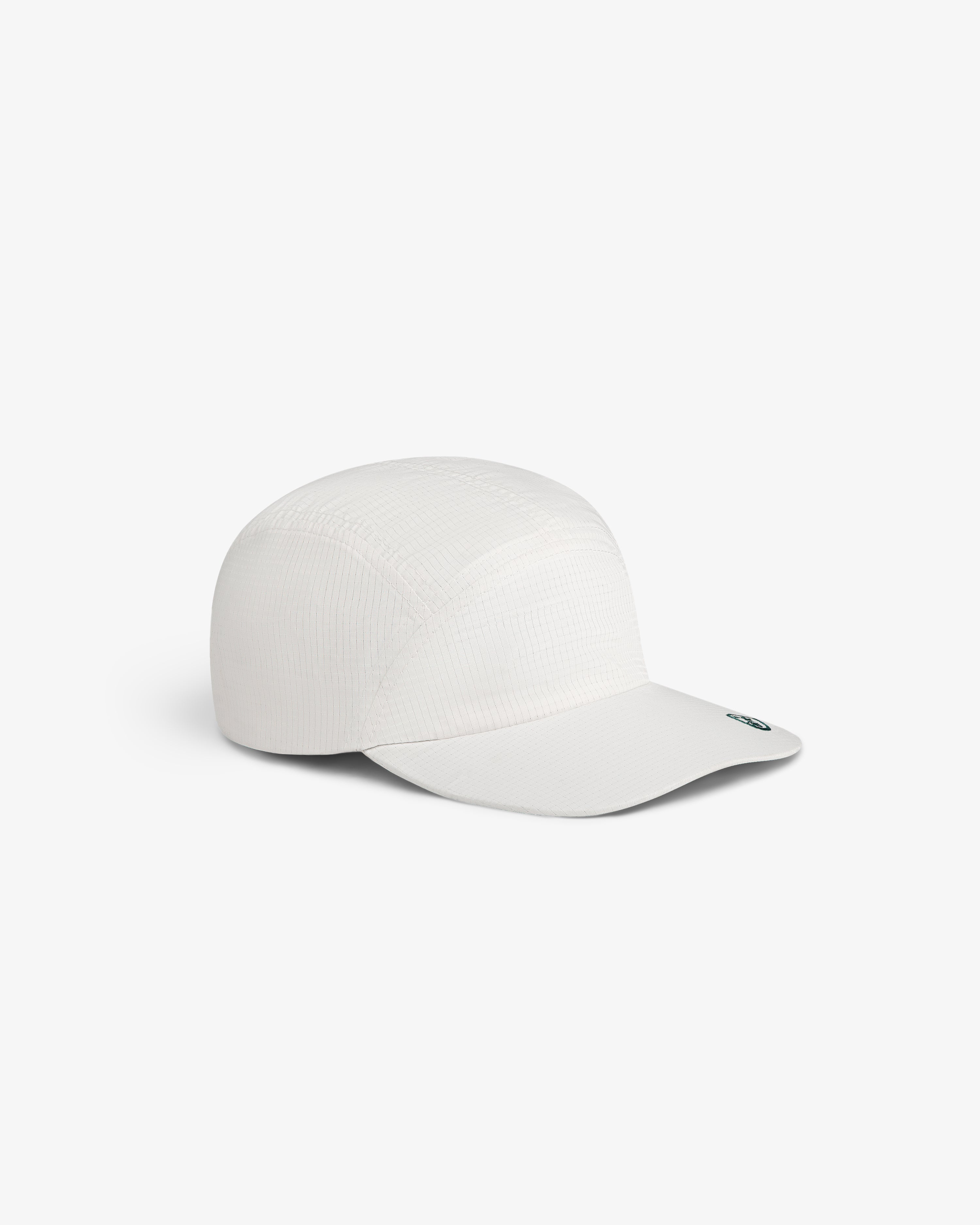 The ALD Golf Performance Sport Hat is a white five-panel cap with a curved brim on a plain background.