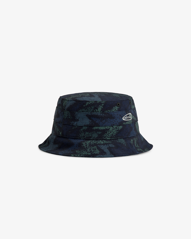 ALD Golf Bucket Hat in dark green and navy camo with a small oval logo patch, shown on a white background.