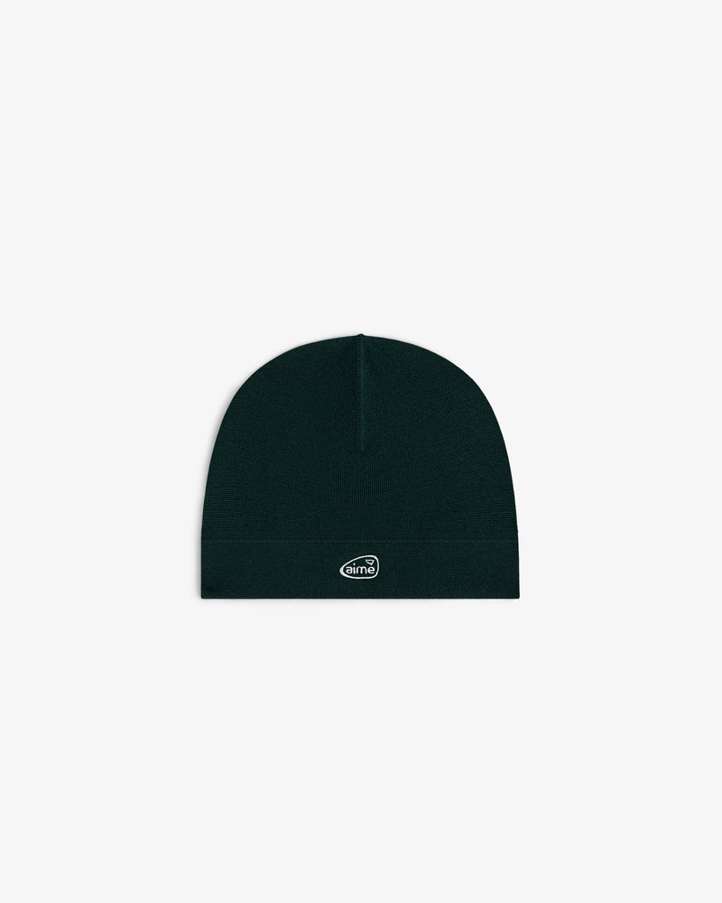 ALD Golf Skull Cap in black with a small oval aimé logo patch on the front, shown on a white background.