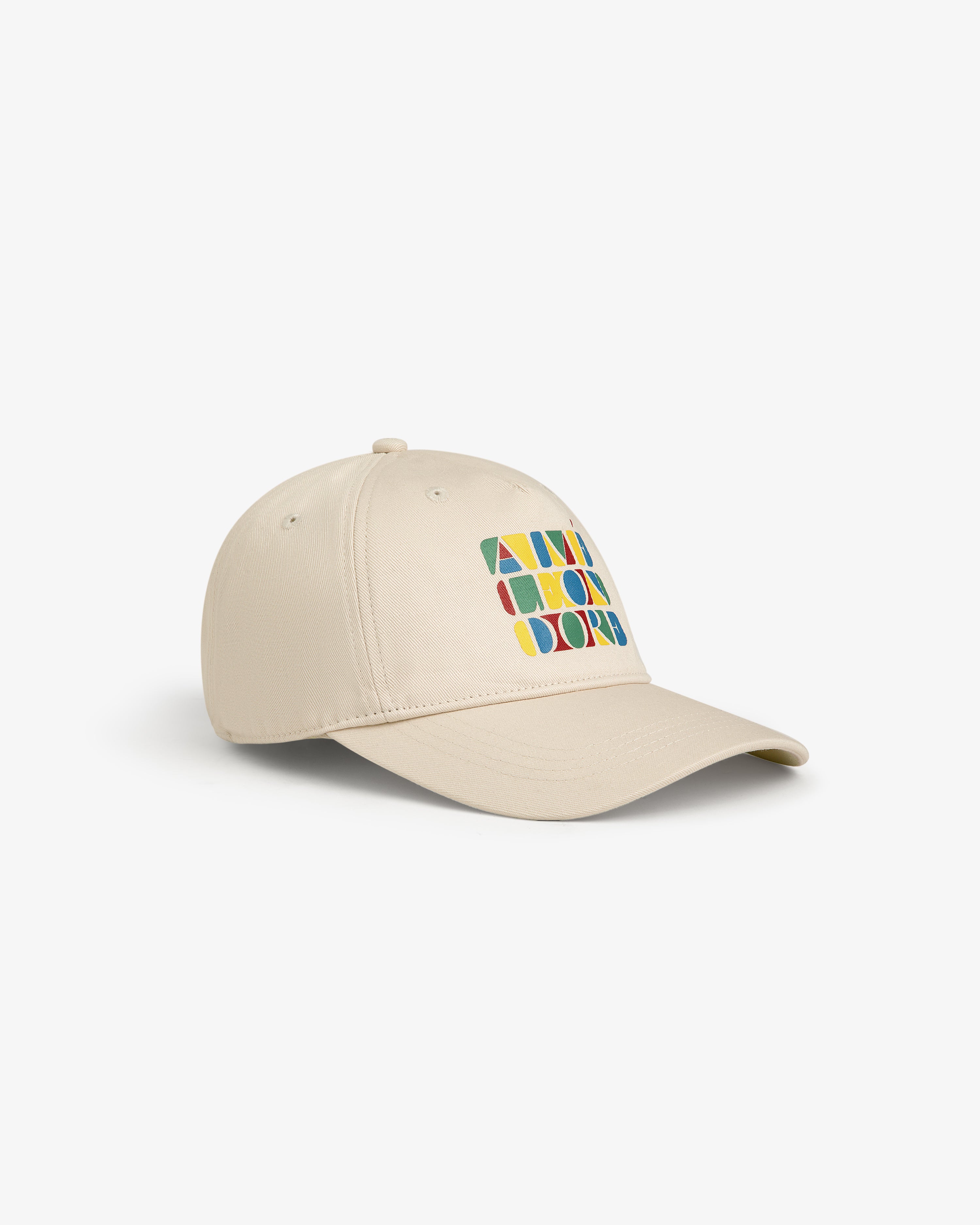 Stacked Logo Hat in beige with colorful geometric shapes and text graphic on front, shown on white background.